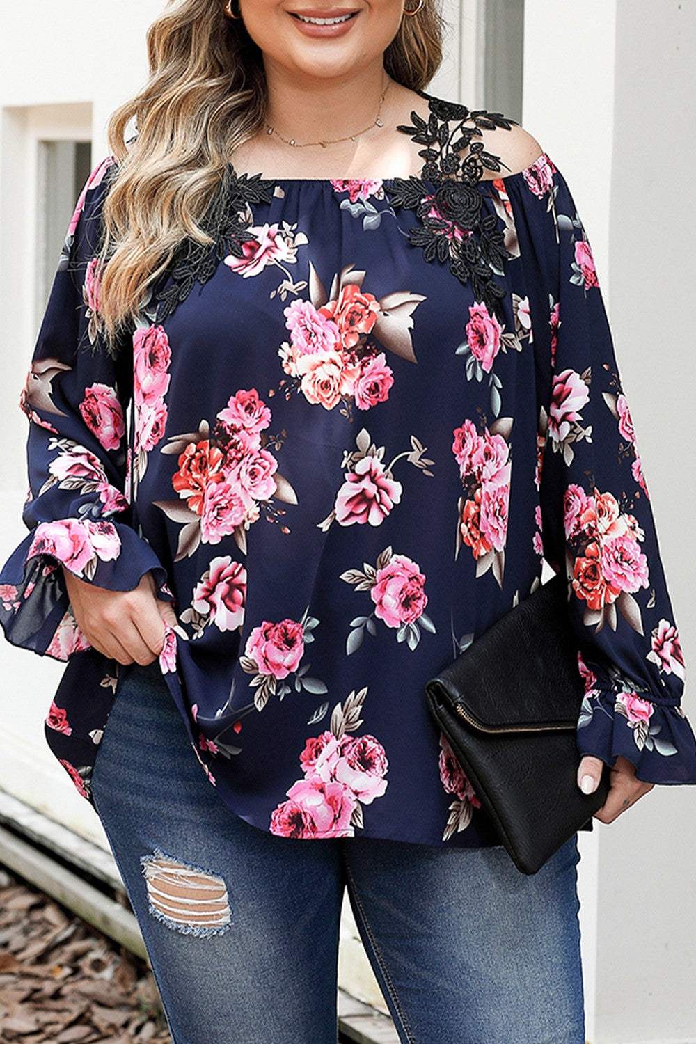 Plus size floral flounce sleeve blouse in navy with pink roses.