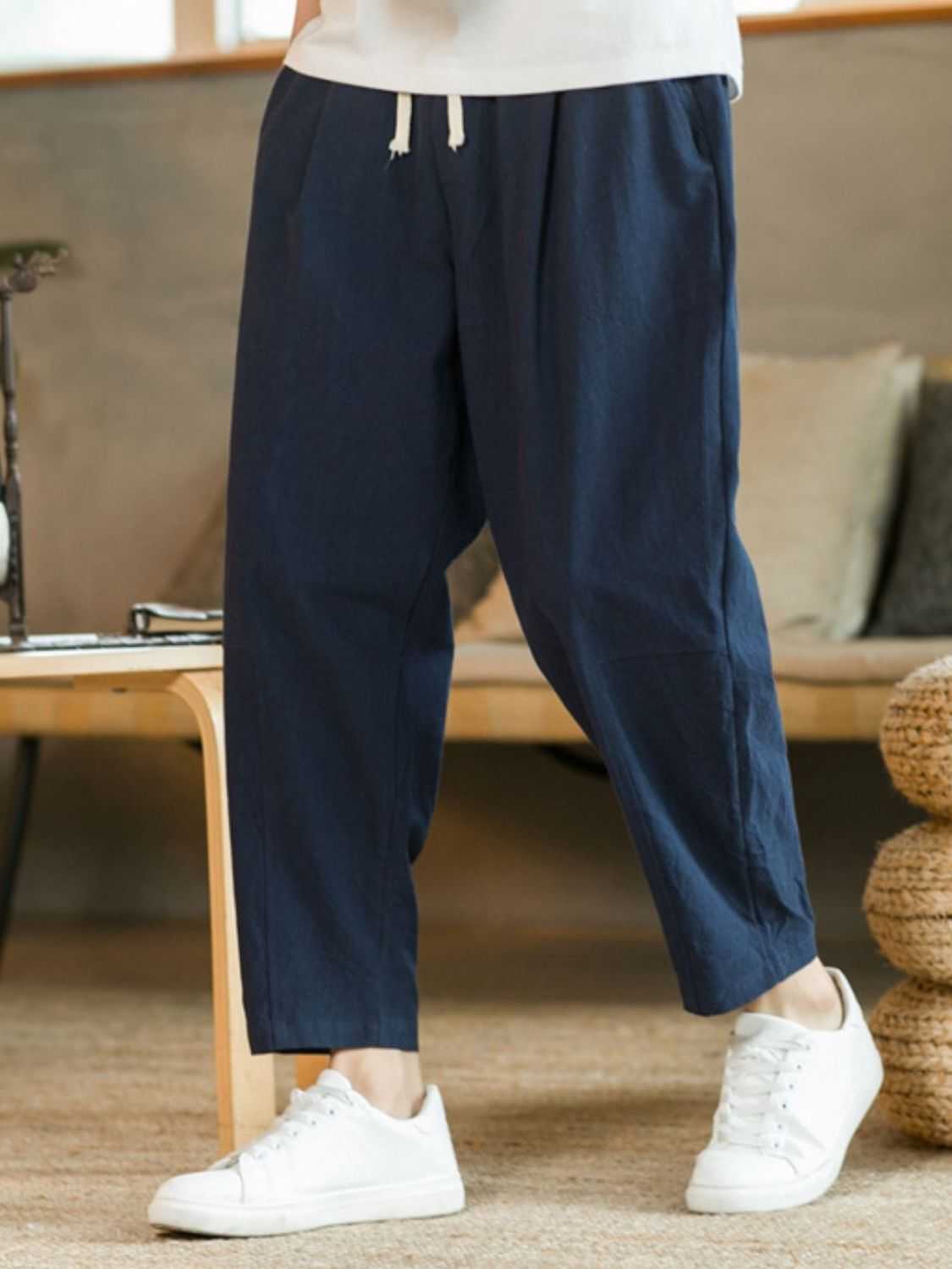 Plus size drawstring pants with pockets, basic style, cotton and flax blend.