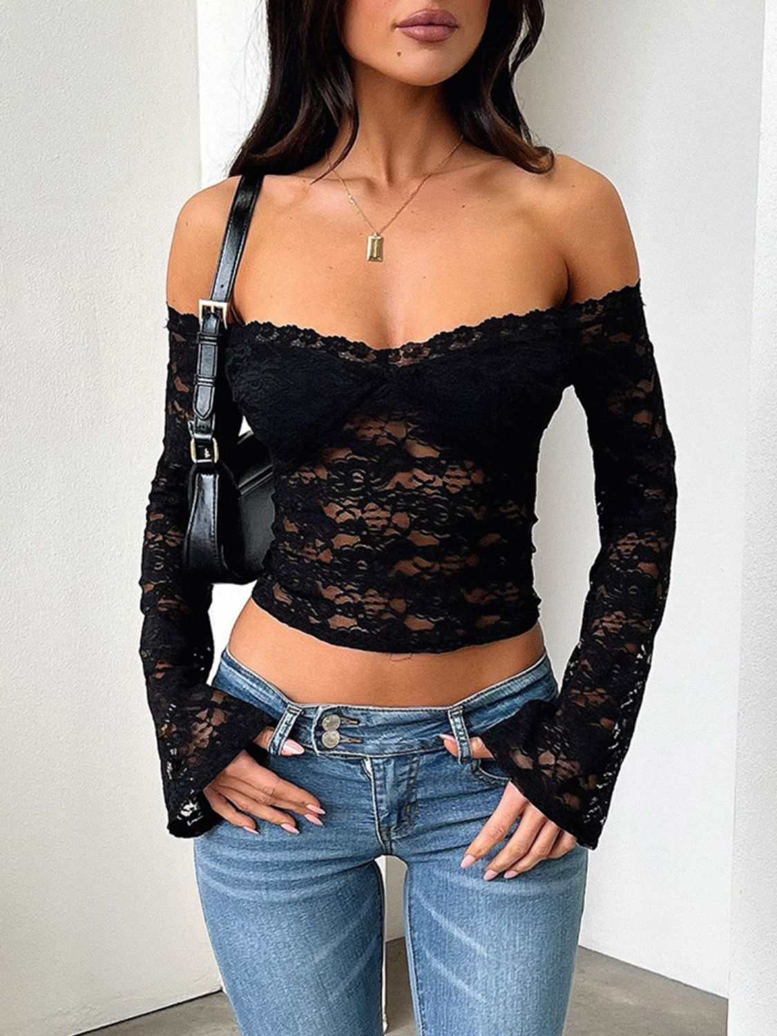 Devine lace off-shoulder long sleeve top in black, semi-sheer with moderate stretch.