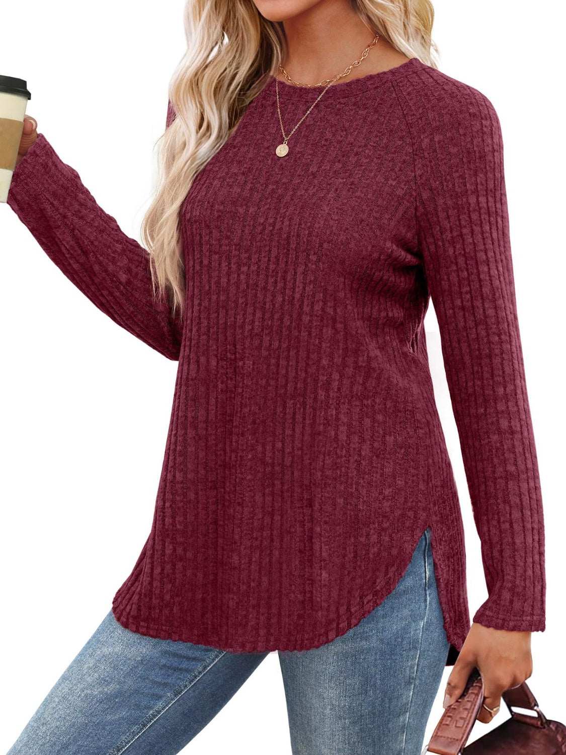 Women's burgundy round neck raglan sleeve t-shirt with side slit.