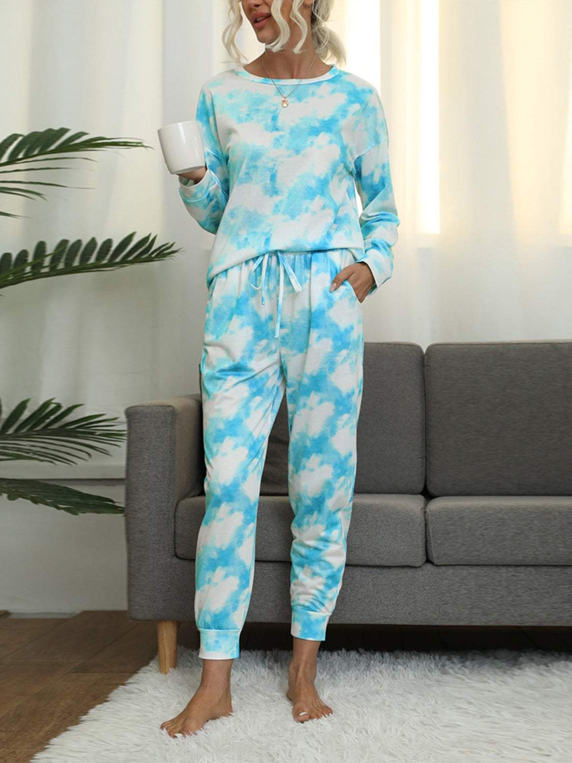 Shiny tie-dye round neck top and pants lounge set in blue and white.