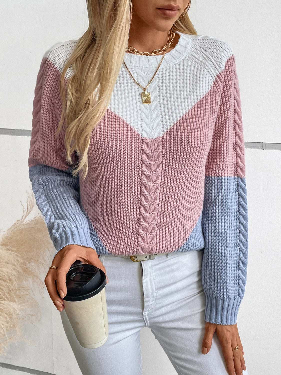 Color block round neck long sleeve sweater in pink, white, and blue.