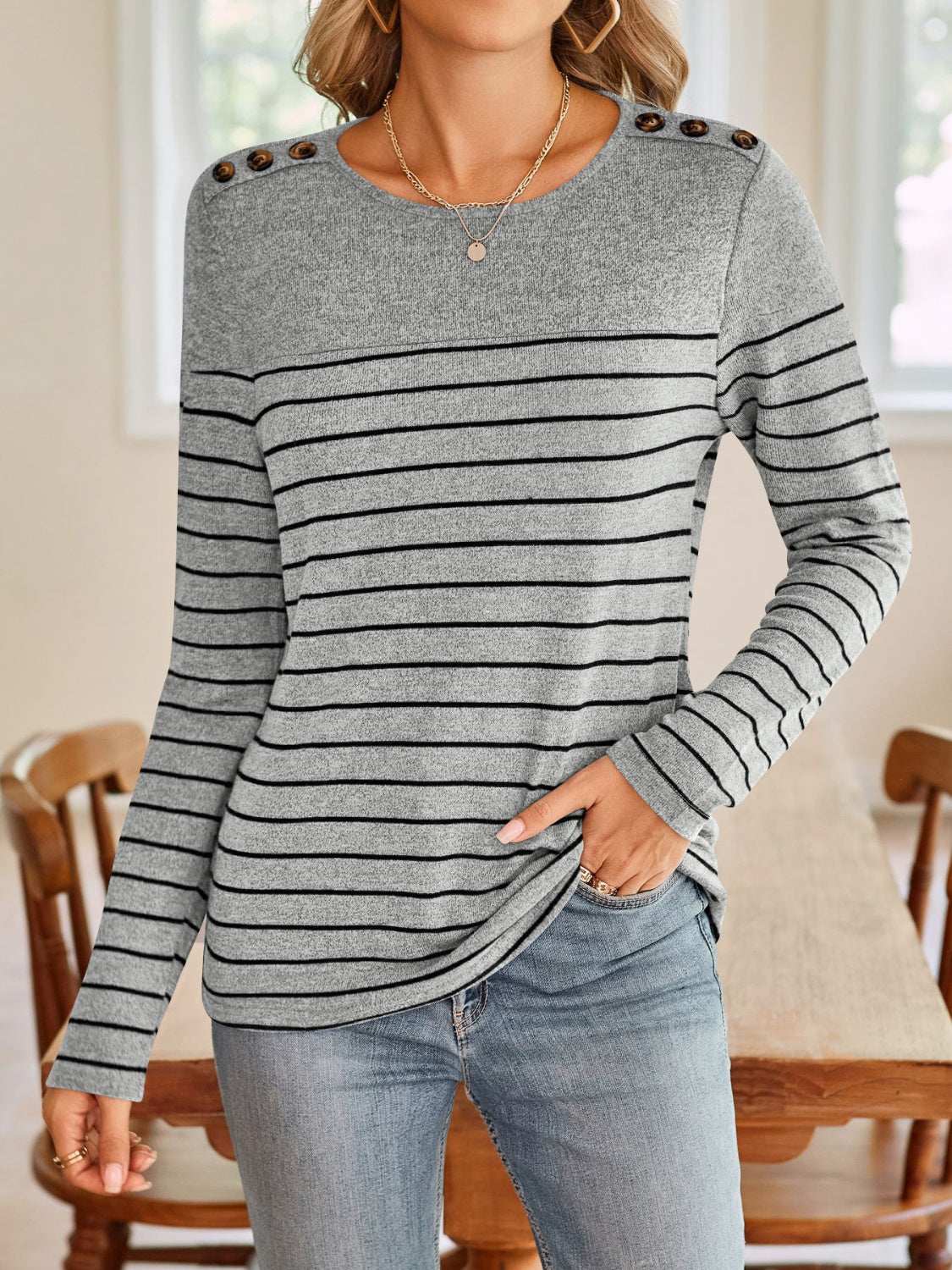 Lovelet striped round neck long sleeve T-shirt with decorative buttons.