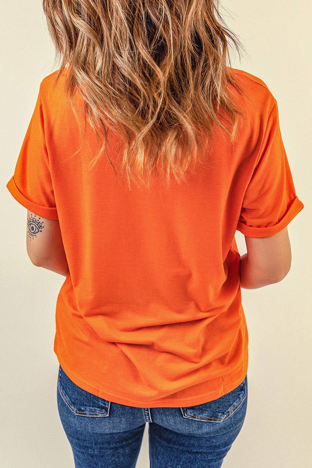 Graphic round neck T-shirt, casual style, short sleeves, orange color.