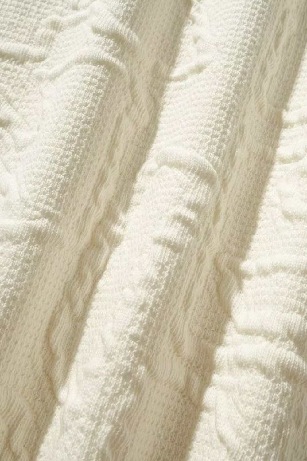 Men's plus size textured sweatshirt fabric detail.