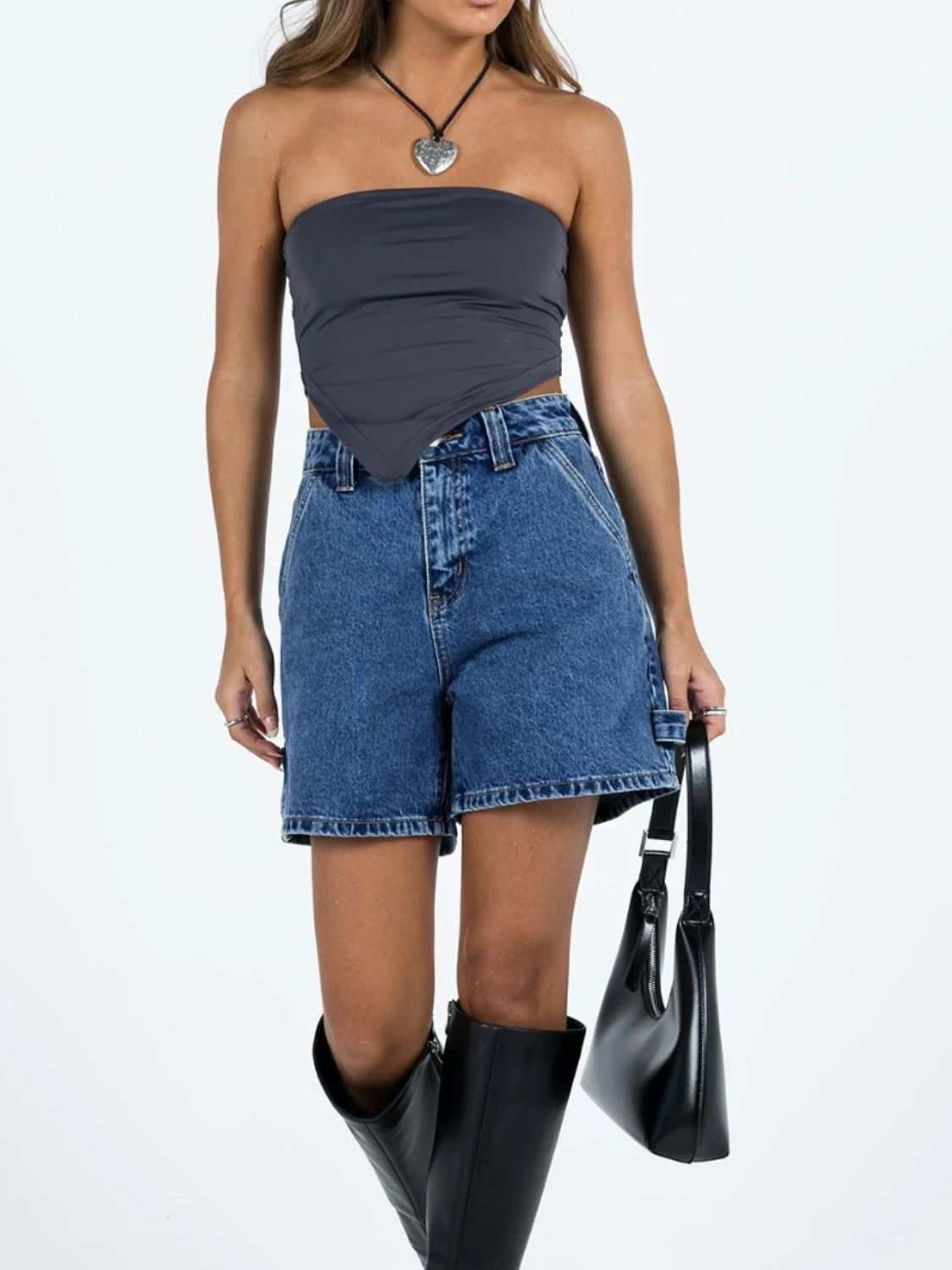 Washed high rise denim shorts with pocket detail and relaxed fit.