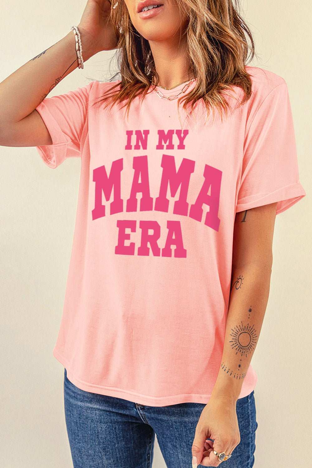 IN MY MAMA ERA round neck T-shirt in pink with bold lettering, slightly stretchy fabric.