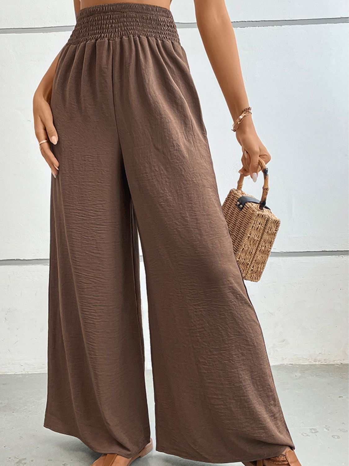 Casual long pants with a wide waistband in solid color.