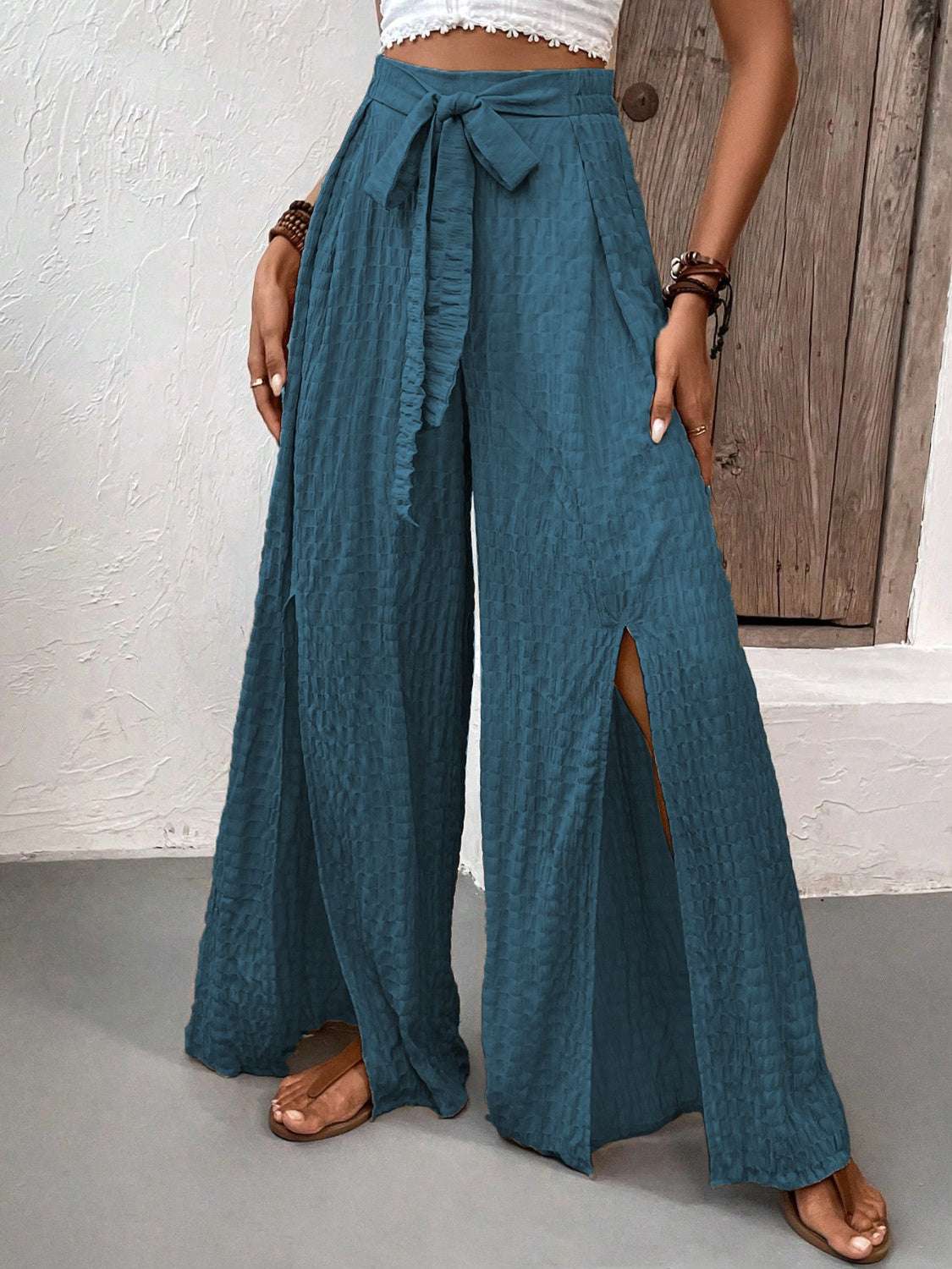 Honey Tied Slit Wide Leg Pants in teal with waist tie and side slits.