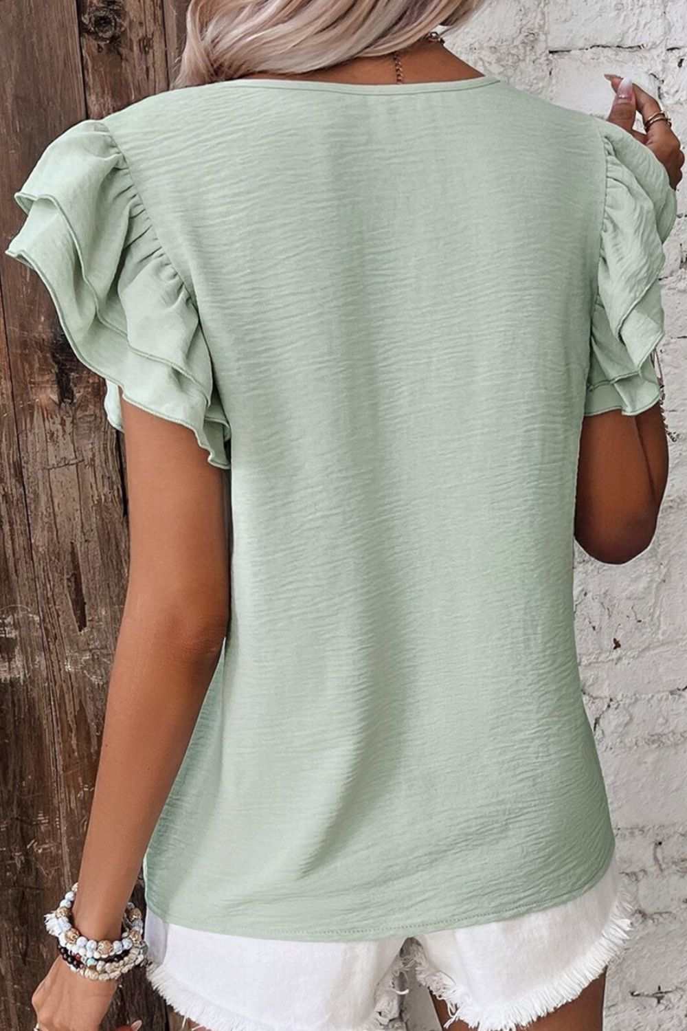 V-Neck Ruffled Cap Sleeve Blouse in green.