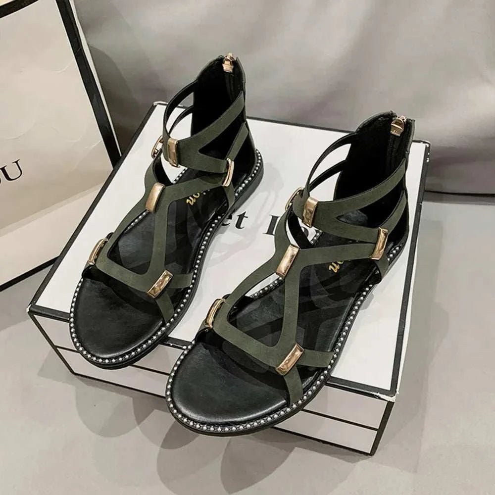 Open toe flat sandals with back zipper and decorative straps, made from elastomer and PU material.