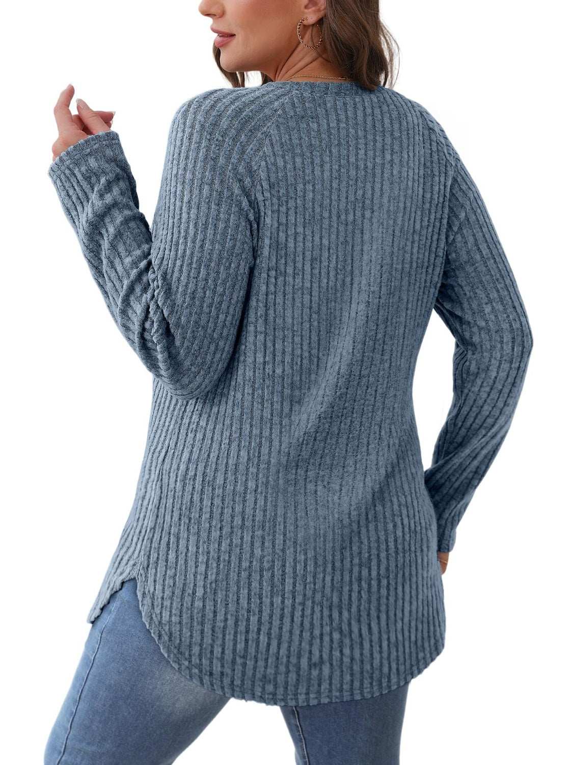 Round neck raglan sleeve t-shirt in blue with slit detail, slightly stretchy fabric.