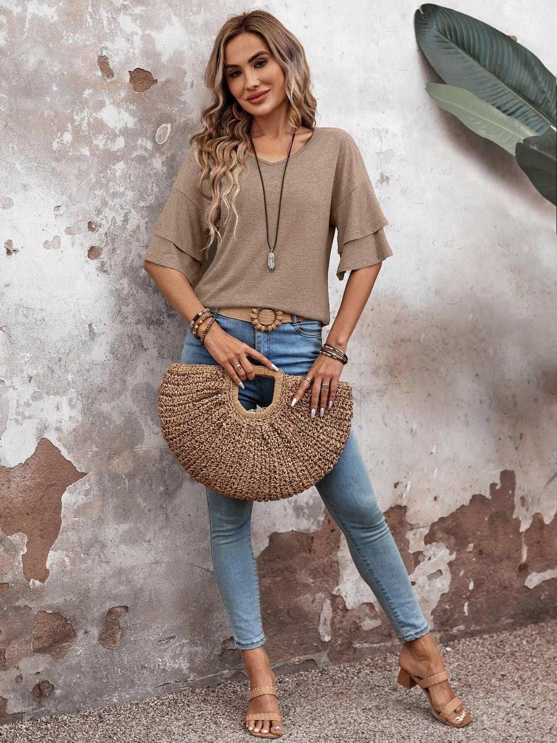 V-Neck Half Sleeve Blouse in beige with jeans and straw bag.