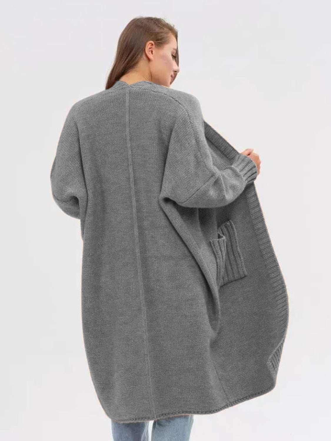 Pocketed open front long sleeve longline cardigan in gray with pockets and moderate stretch.