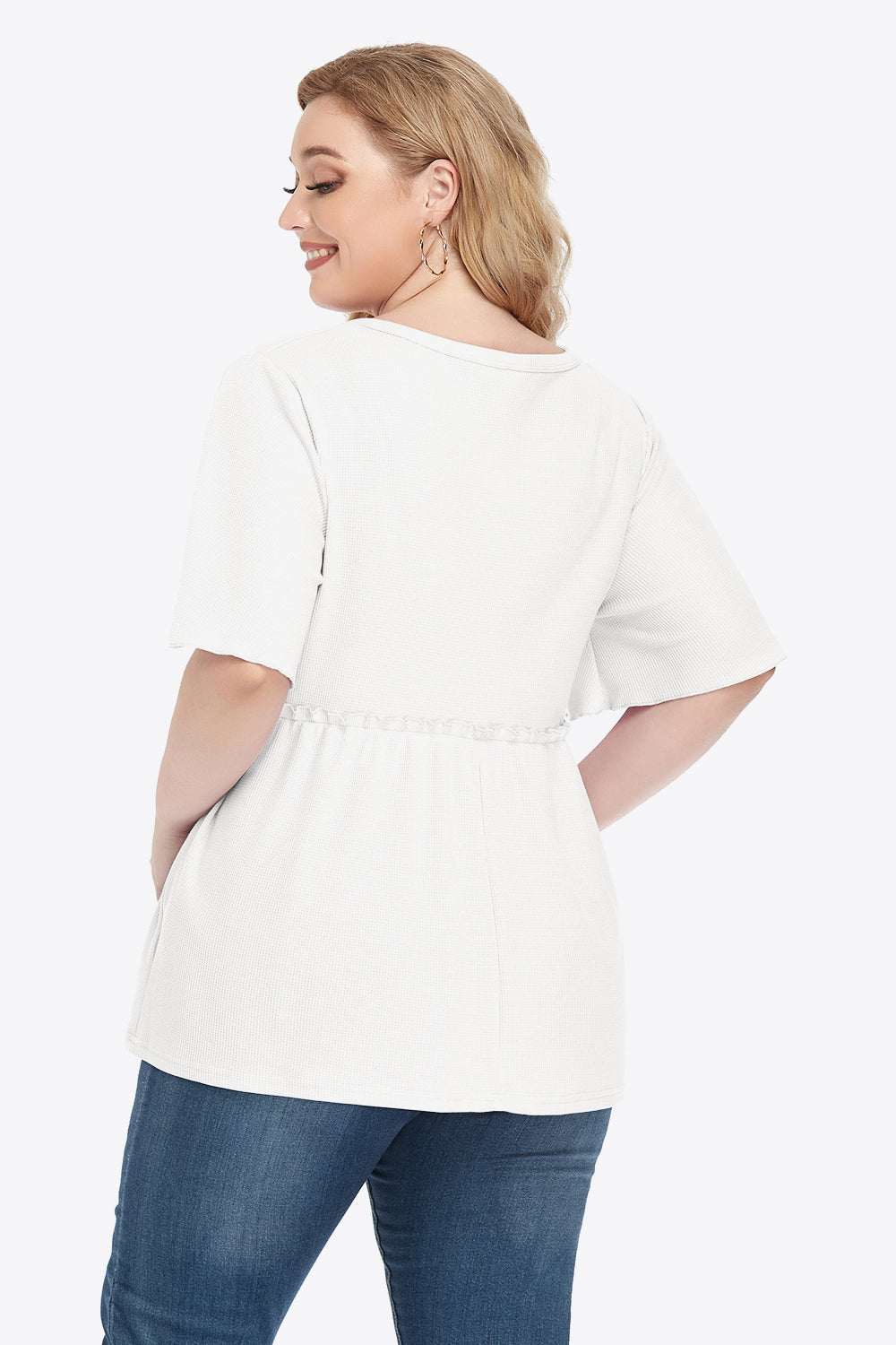 Plus size white buttoned V-neck frill trim babydoll blouse with flutter sleeves.
