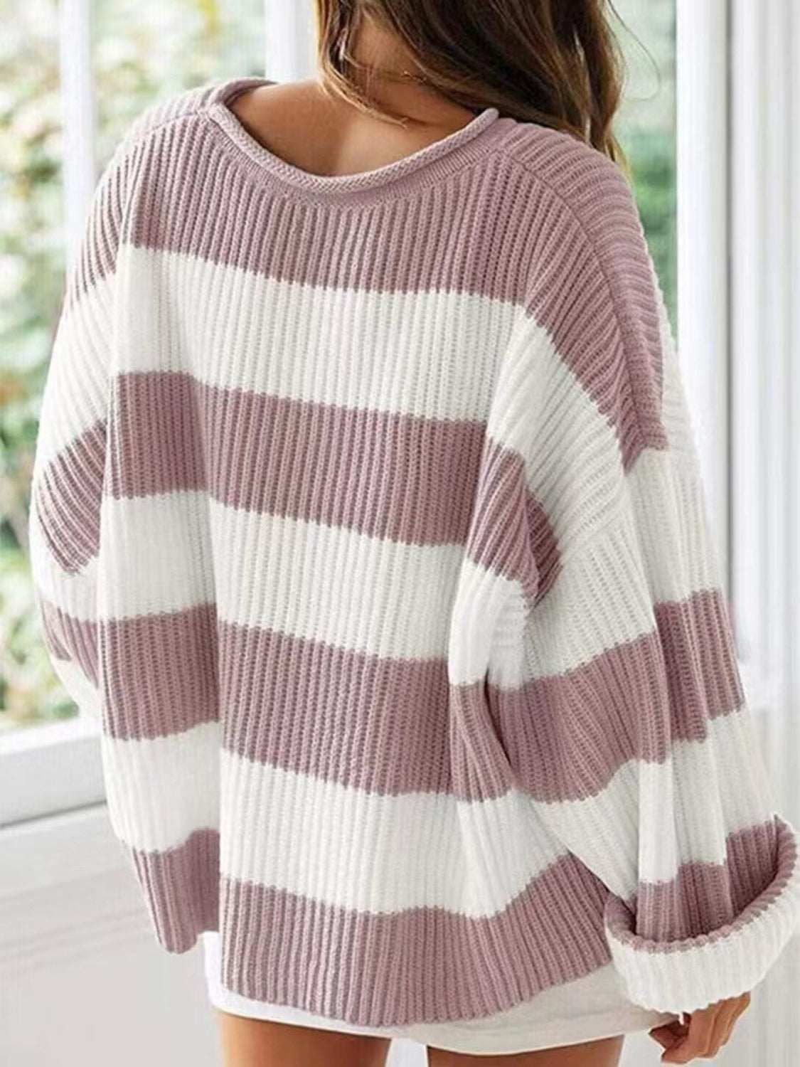 Round neck long sleeve sweater with striped pattern, slightly stretchy, 100% polyester.