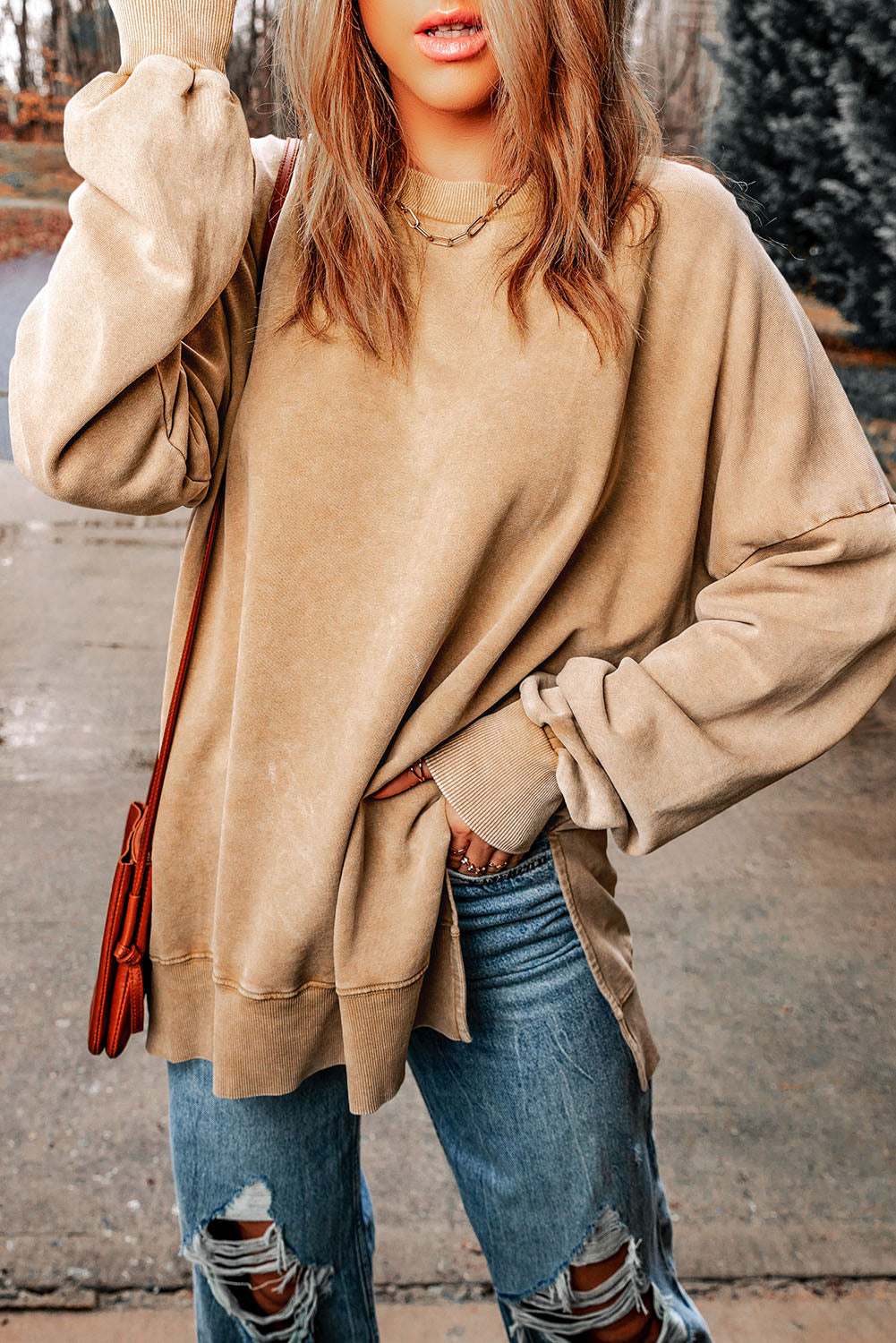 Dropped shoulder round neck long sleeve blouse in solid color.