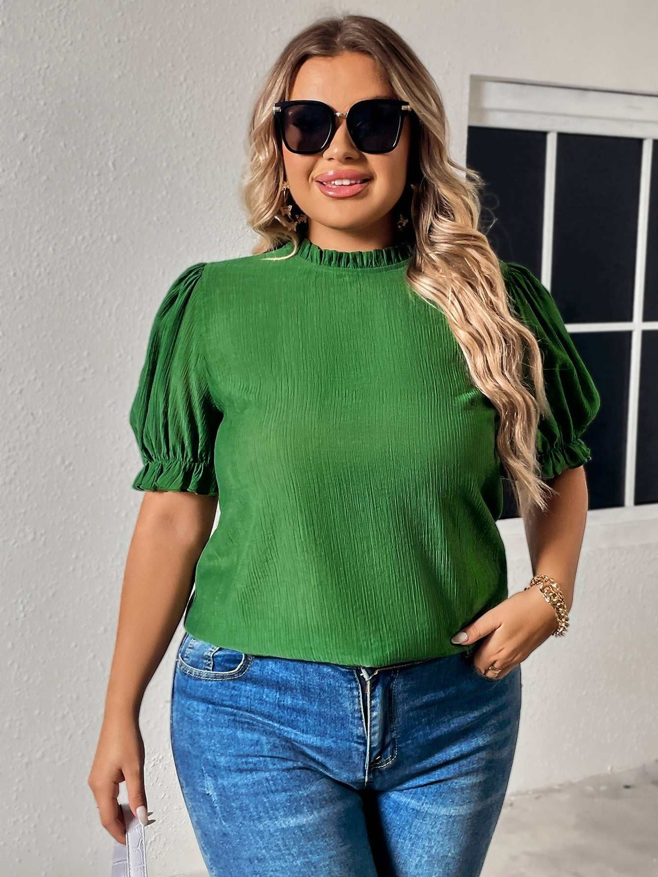 Plus size green blouse with round neck and puff flounce short sleeves, casual style.