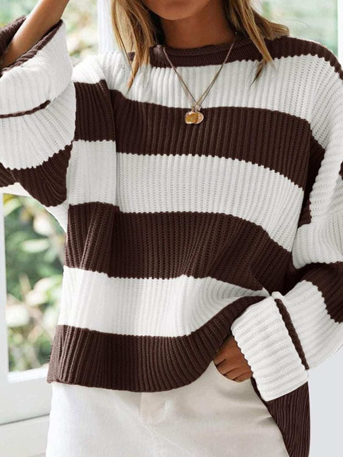 Round neck long sleeve sweater with brown and white stripes.