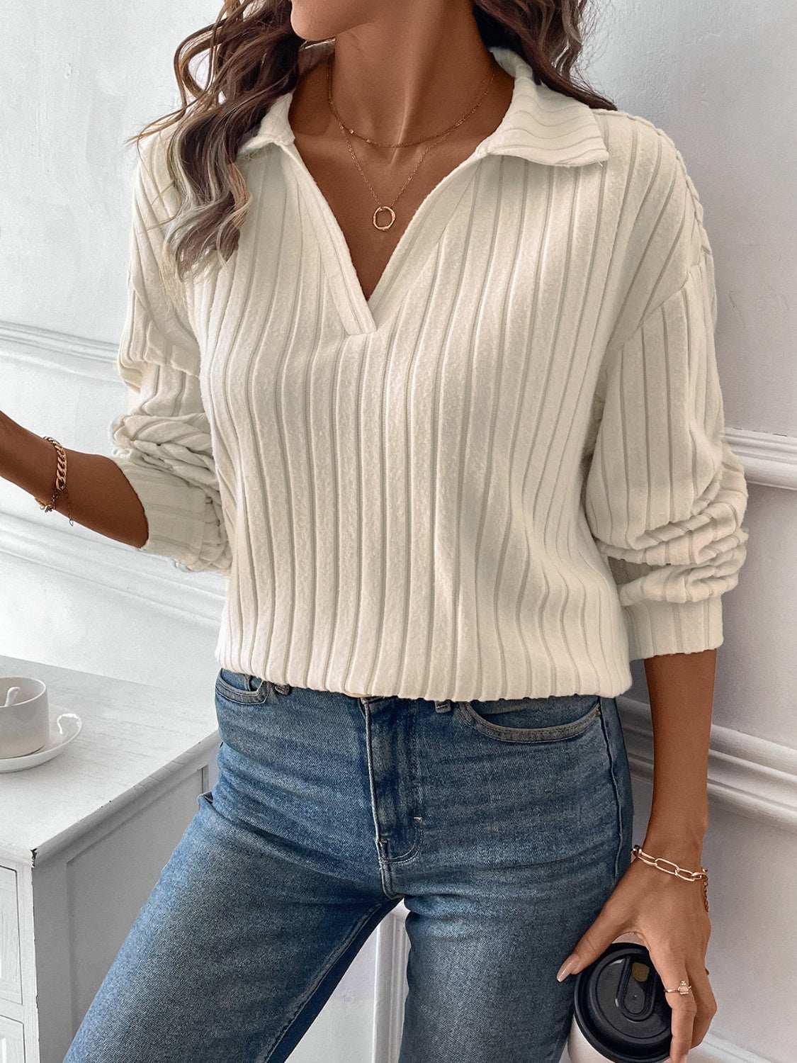 Ribbed Johnny Collar Long Sleeve T-Shirt in white with moderate stretch, styled casually with jeans.