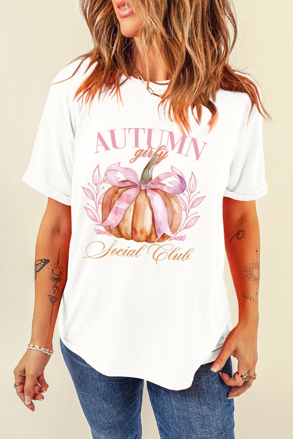 White t-shirt with pumpkin graphic and "Autumn Girl" text, round neck, short sleeves.