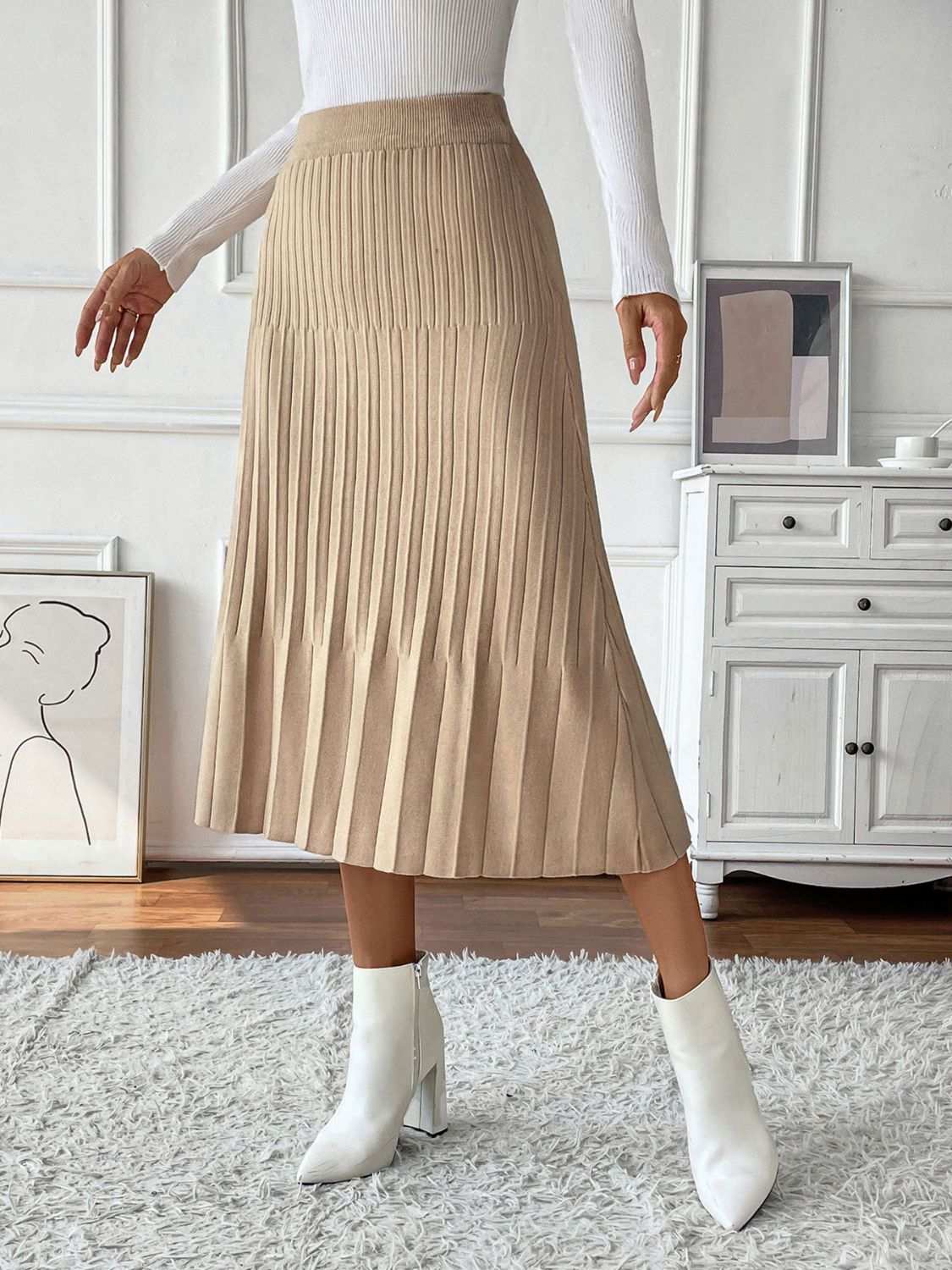 Perfee Pleated Midi Sweater Skirt in beige, basic style, stretchy fabric.
