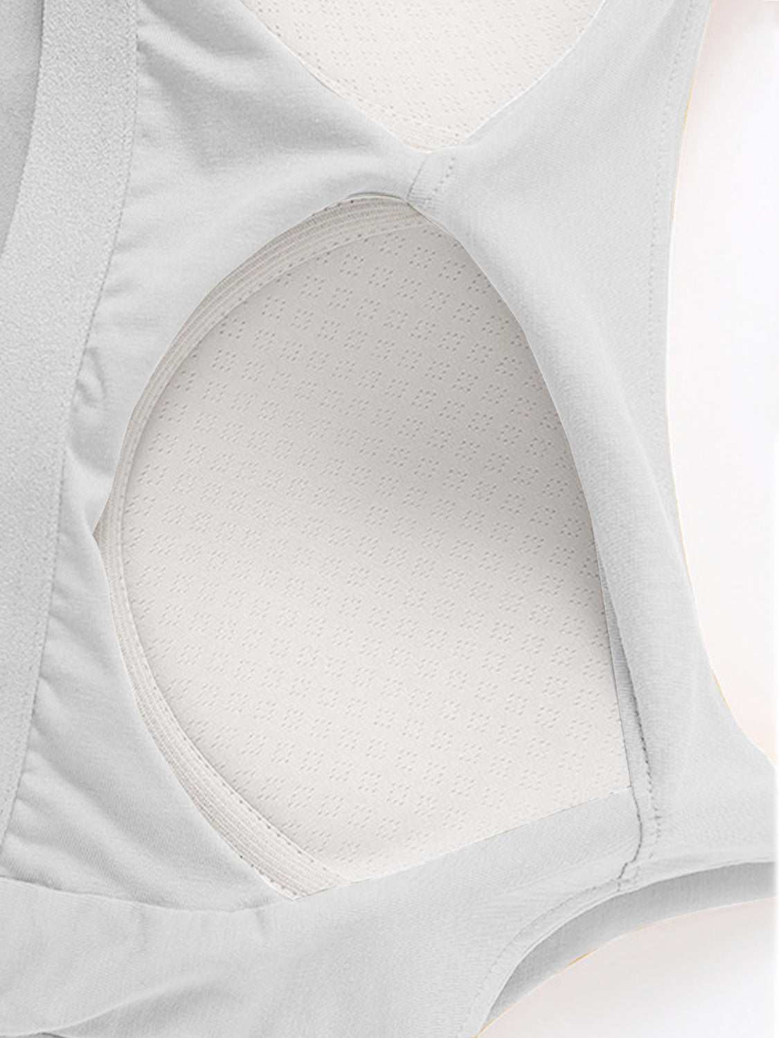 Scoop neck cropped cami with chest pads, highly stretchy fabric.