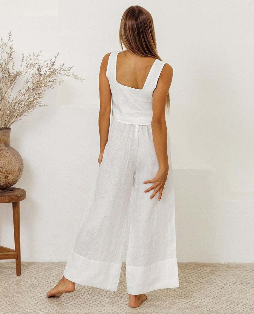 Square neck sleeveless top and pants set in white, tied and ruffled design, 100% cotton.