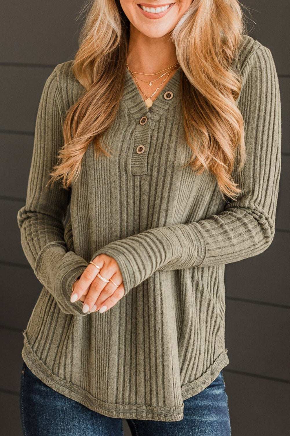 Ribbed buttoned long sleeve blouse in olive green, slightly stretchy fabric, ideal for casual style.