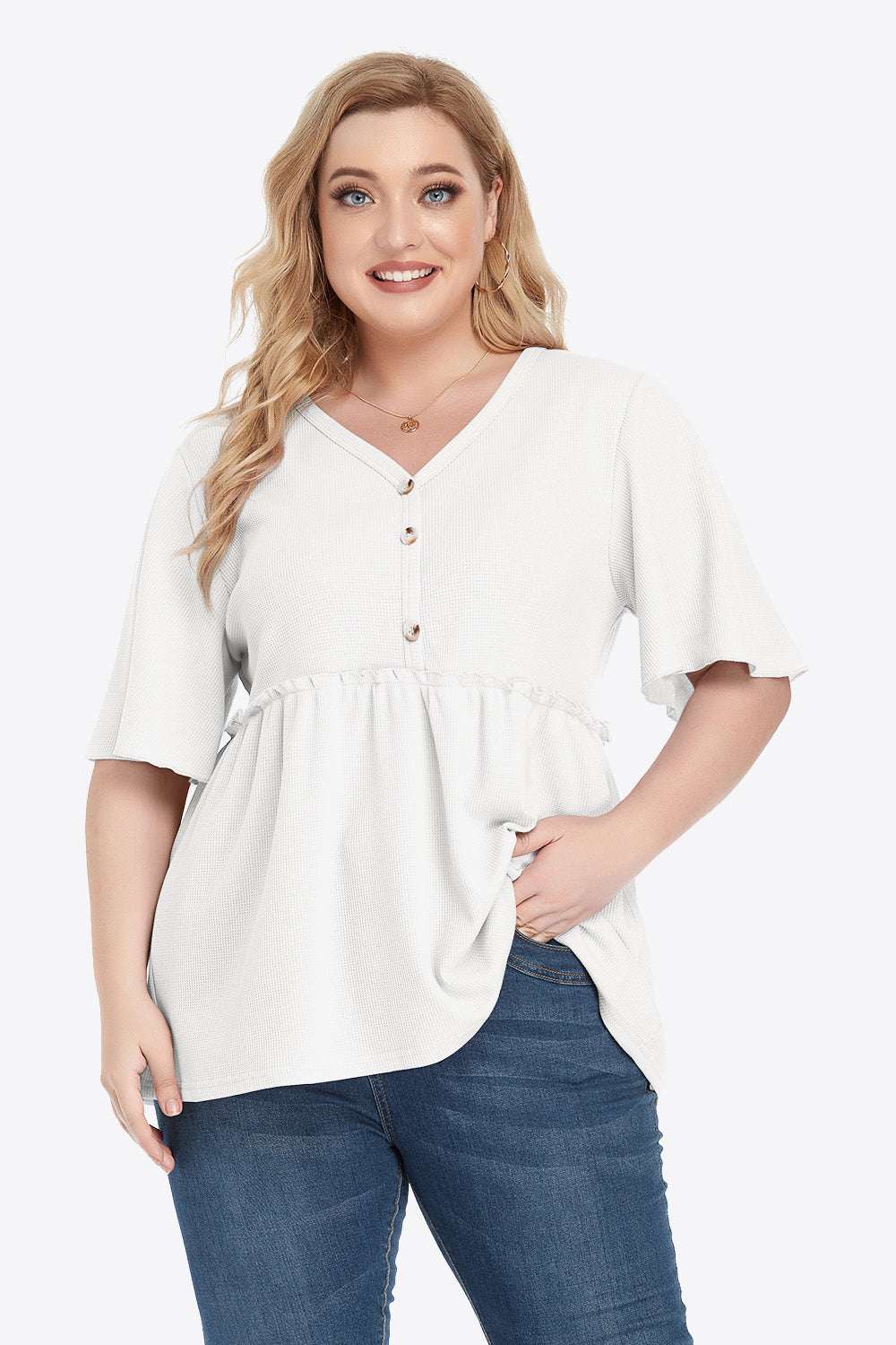 Plus size V-neck frill trim babydoll blouse with button details.