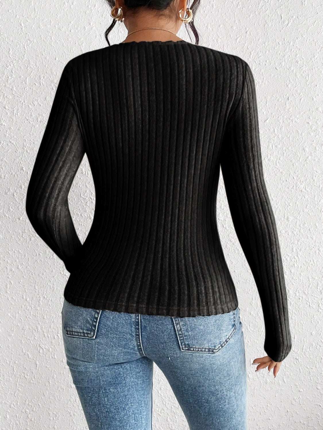 Honey ribbed long sleeve t-shirt, black, slightly stretchy polyester blend.