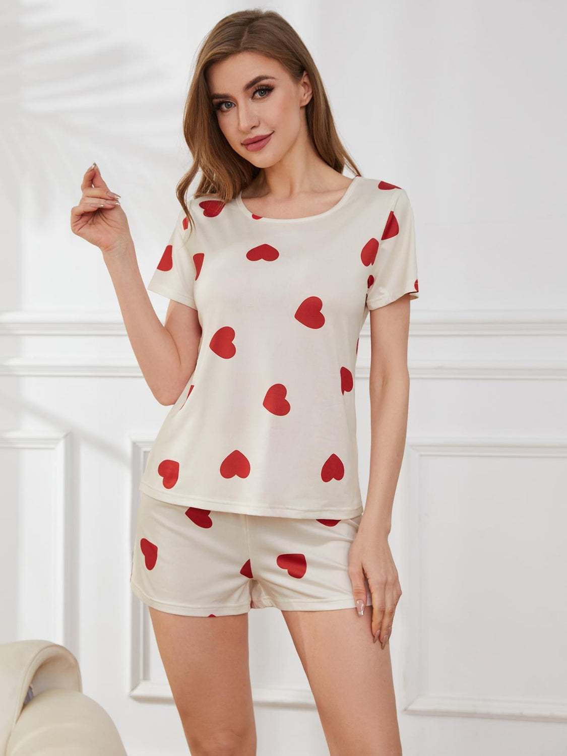 Heart round neck top and shorts lounge set with red heart pattern.