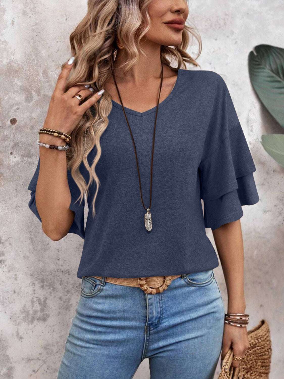 V-Neck Half Sleeve Blouse, slightly stretchy, polyester-rayon blend, casual style.