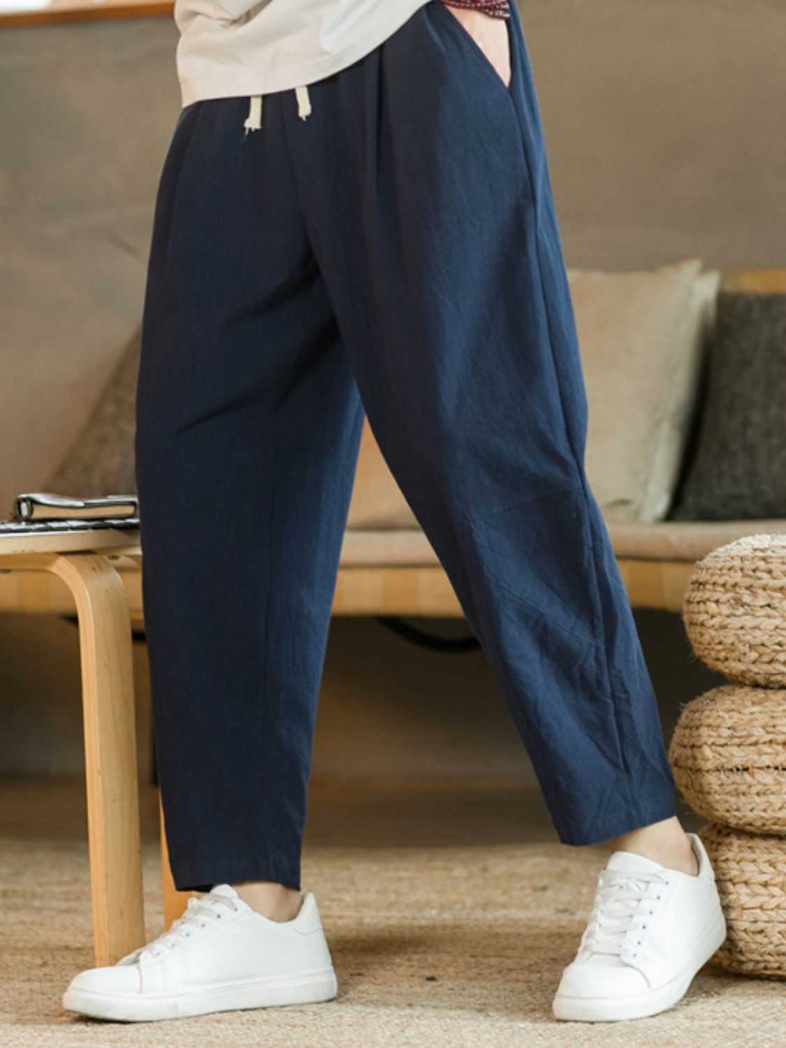 Plus size drawstring pants with pockets, cotton-flax blend, in navy blue.