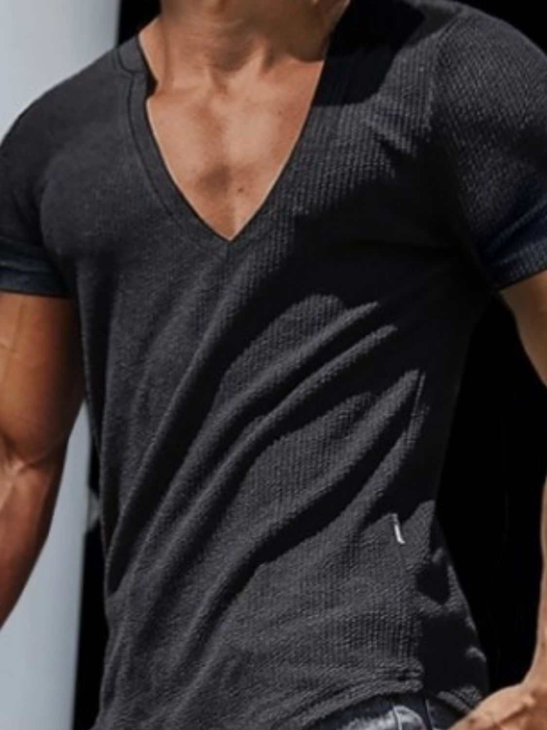 Men's full size notched short sleeve T-shirt, stretchy polyester-cotton blend.