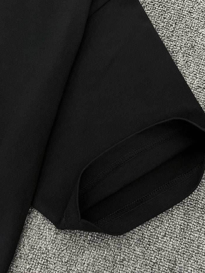 Black men's round neck short sleeve t-shirt fabric detail.