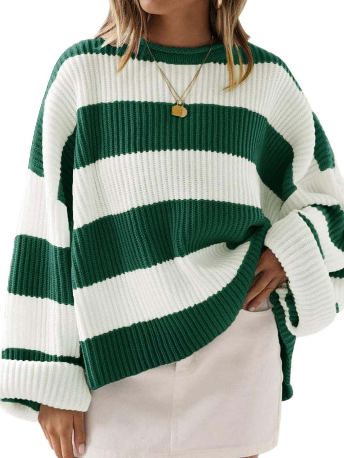 Round neck long sleeve sweater in green and white stripes, slightly stretchy polyester.