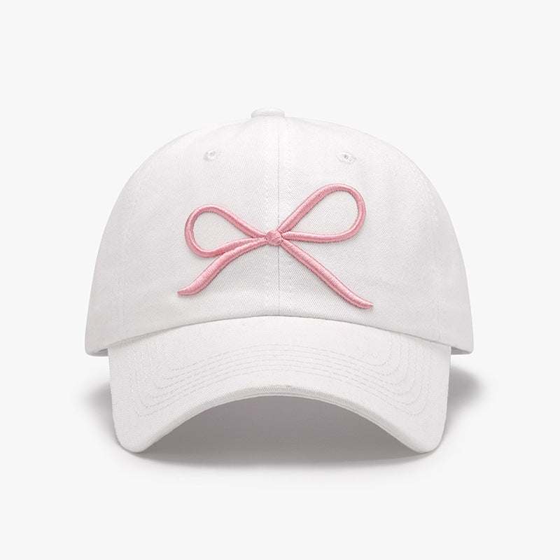 Bow Embroidered Cotton Baseball Cap in white with pink bow design.