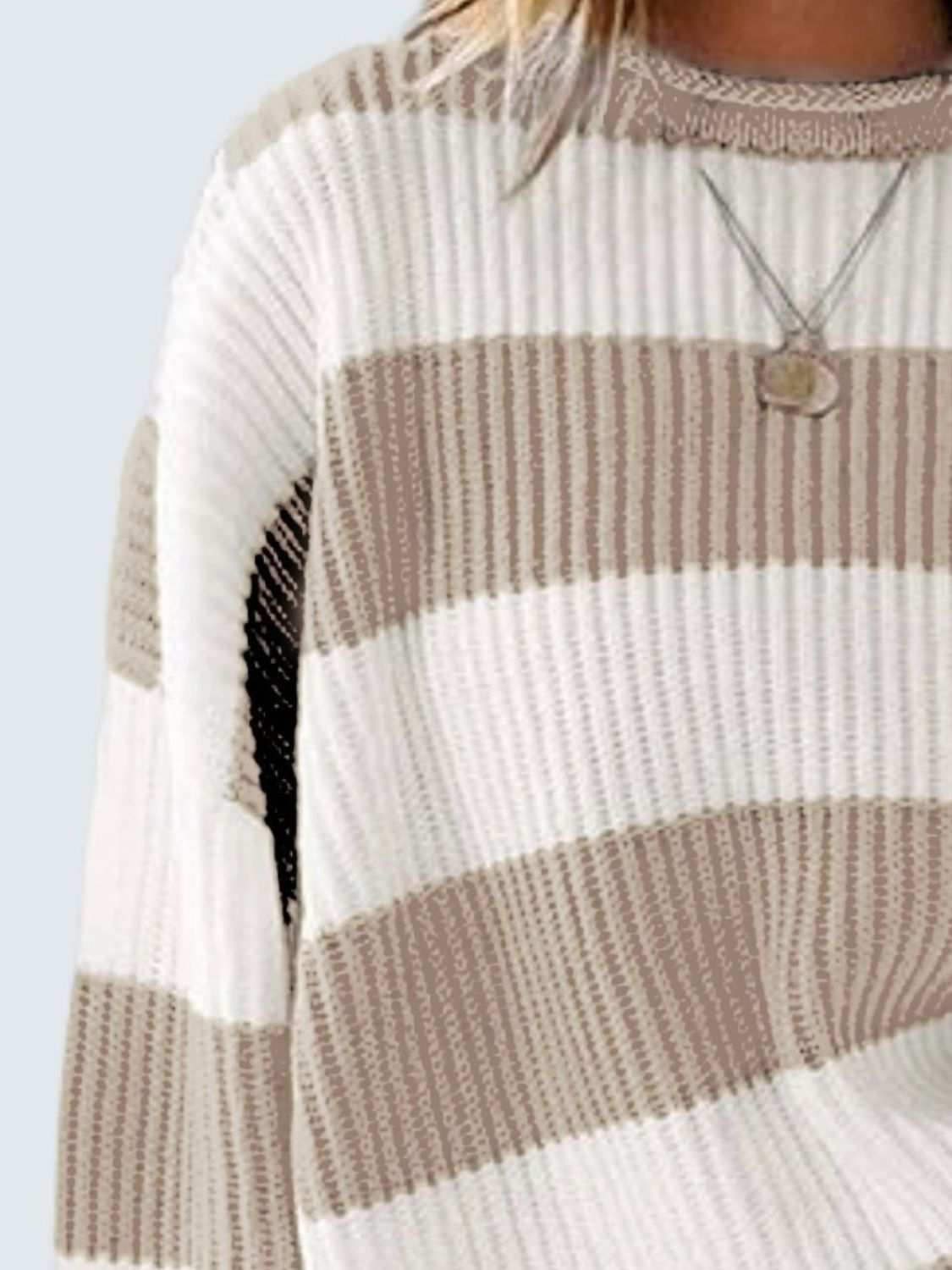 Round neck long sleeve sweater with beige and white stripes, made from 100% polyester.