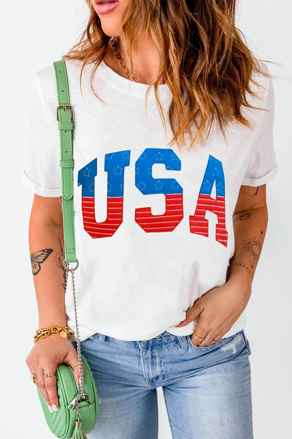 USA Round Neck Short Sleeve T-Shirt with blue and red lettering, white background, slightly stretchy fabric.