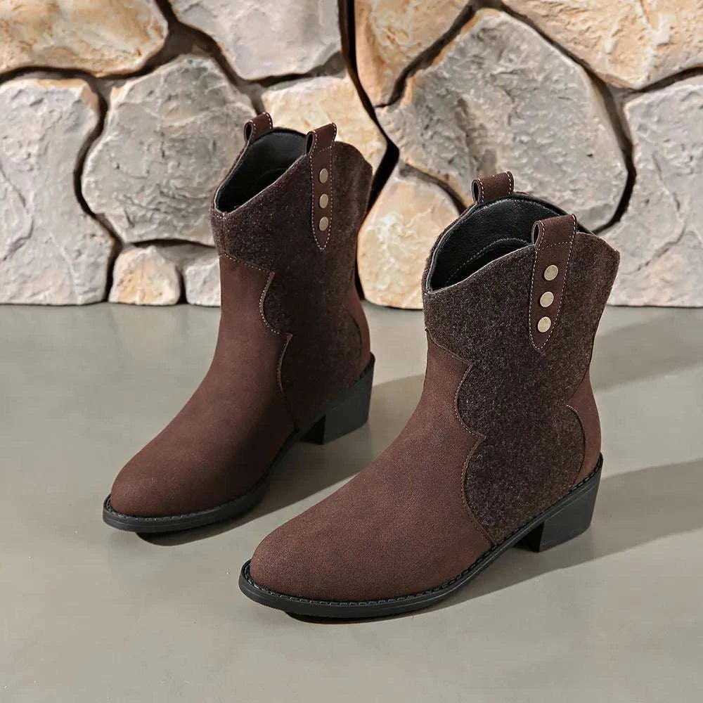 Suede point toe block heel boots with low heels.