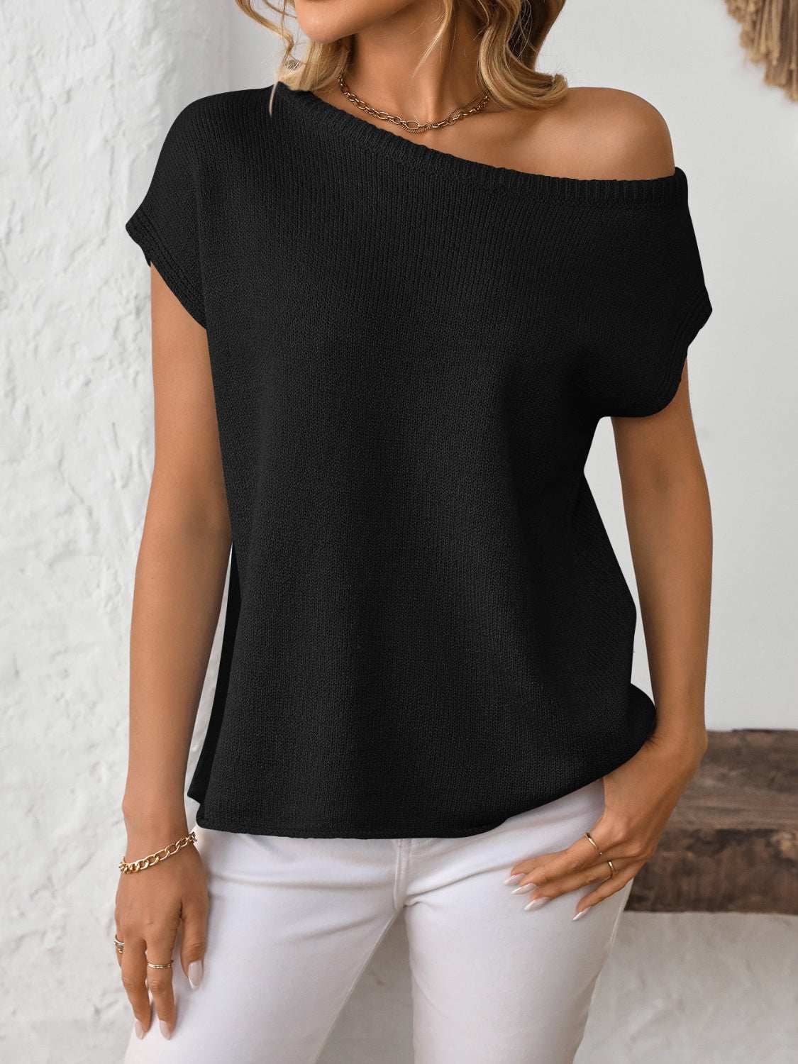 Mandy Boat Neck Short Sleeve Knit Top in black, featuring a basic style and moderate stretch, made from polyester blend.
