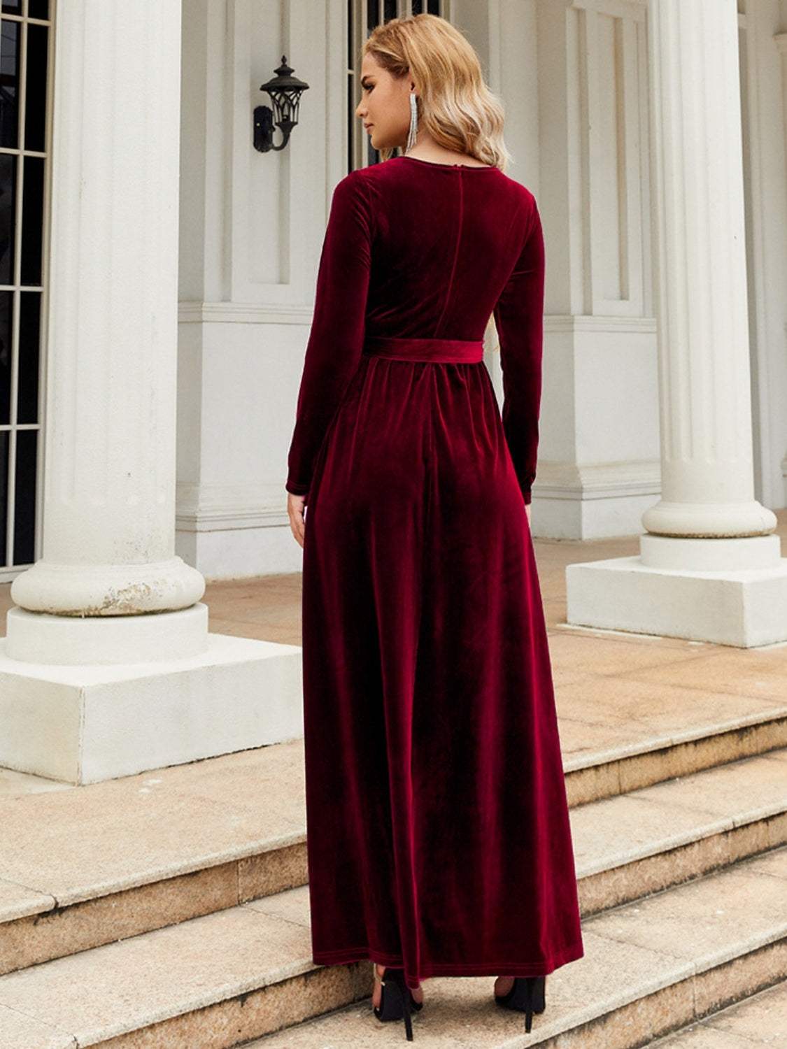 Tie front round neck long sleeve maxi dress in red, shown from the back, featuring a basic style with opaque and slightly stretchy 100% polyester material.