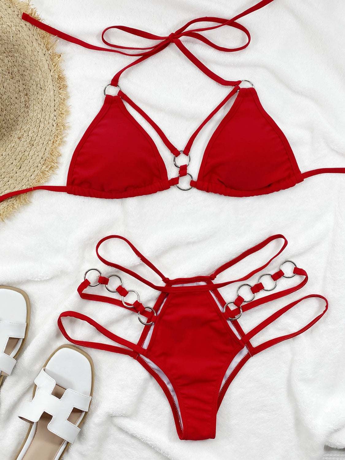 Red cutout halter neck two-piece bikini set with removable padding.
