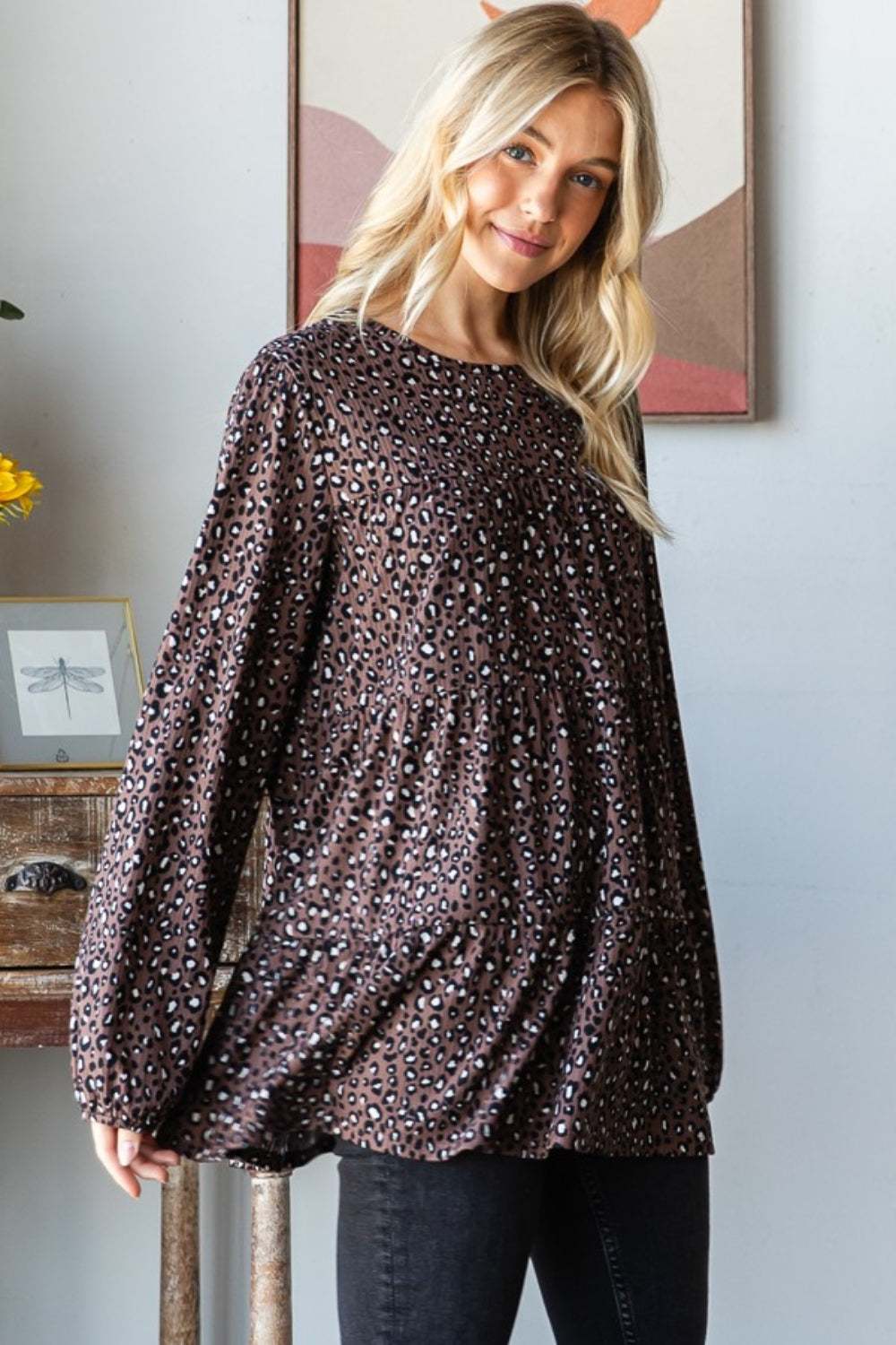 Heimish Leopard Long Sleeve Tiered Blouse worn by model, showcasing trendy leopard print and flowy design.