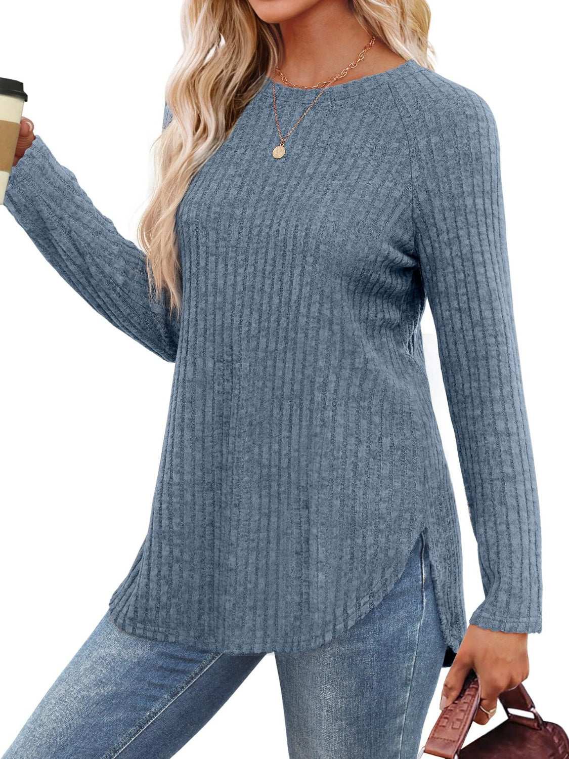 Round neck raglan sleeve t-shirt in blue, ribbed texture, long sleeves, paired with jeans.