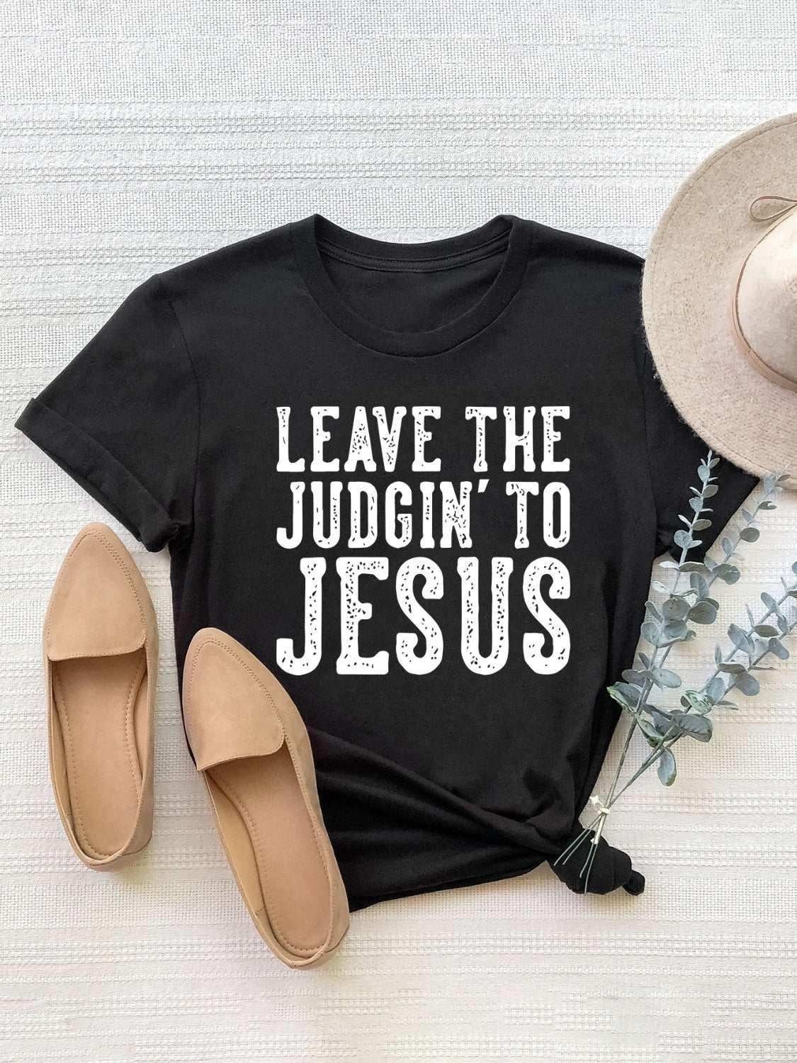 Letter graphic round neck short sleeve T-shirt in black with "Leave the Judgin' to Jesus" text.