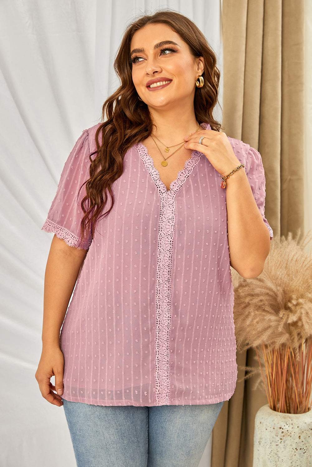 Plus size Swiss dot lace V-neck blouse with short sleeves in solid color.