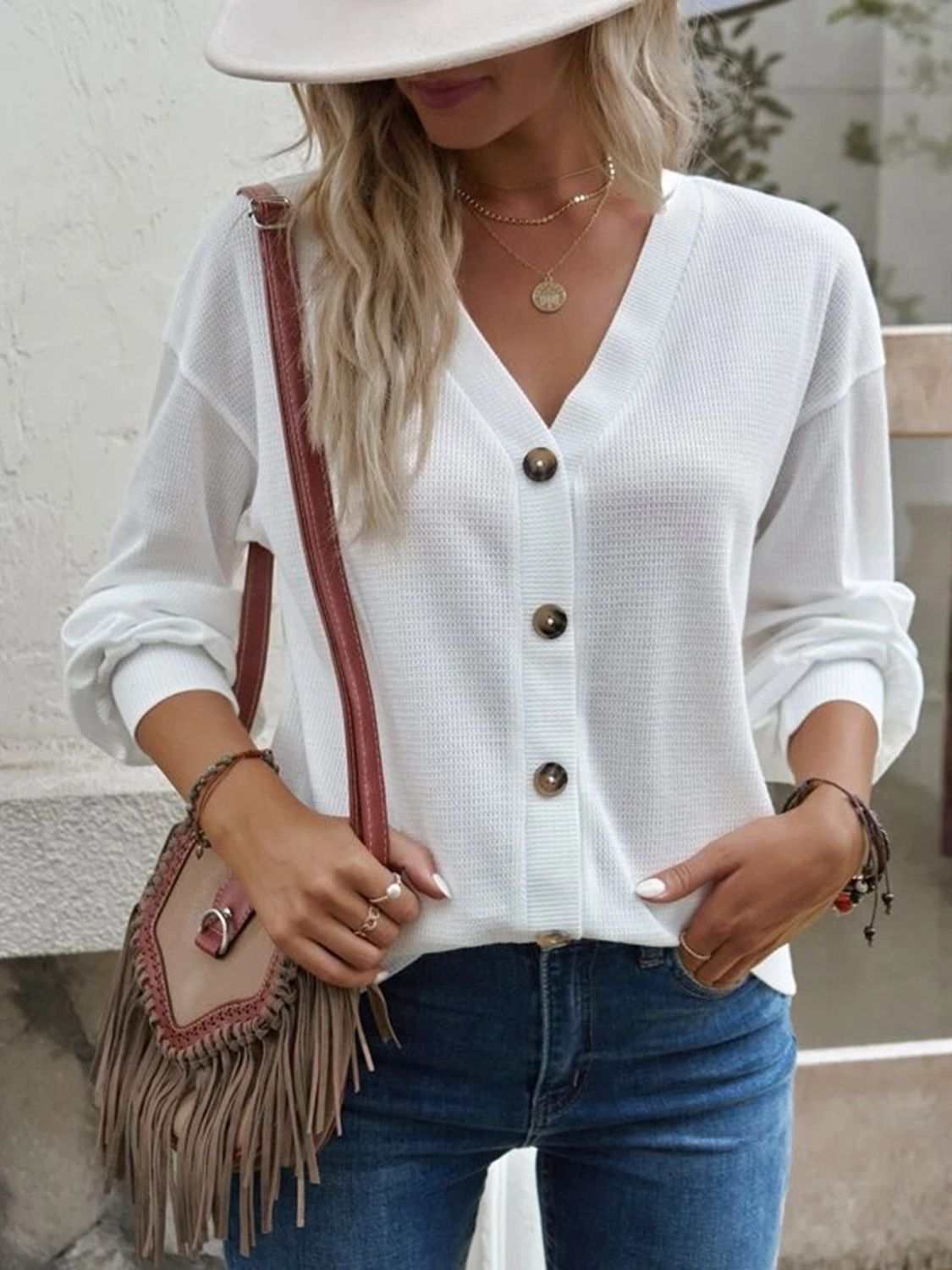 V-Neck Dropped Shoulder Blouse in white with long sleeves and waffle-knit texture, casual style.
