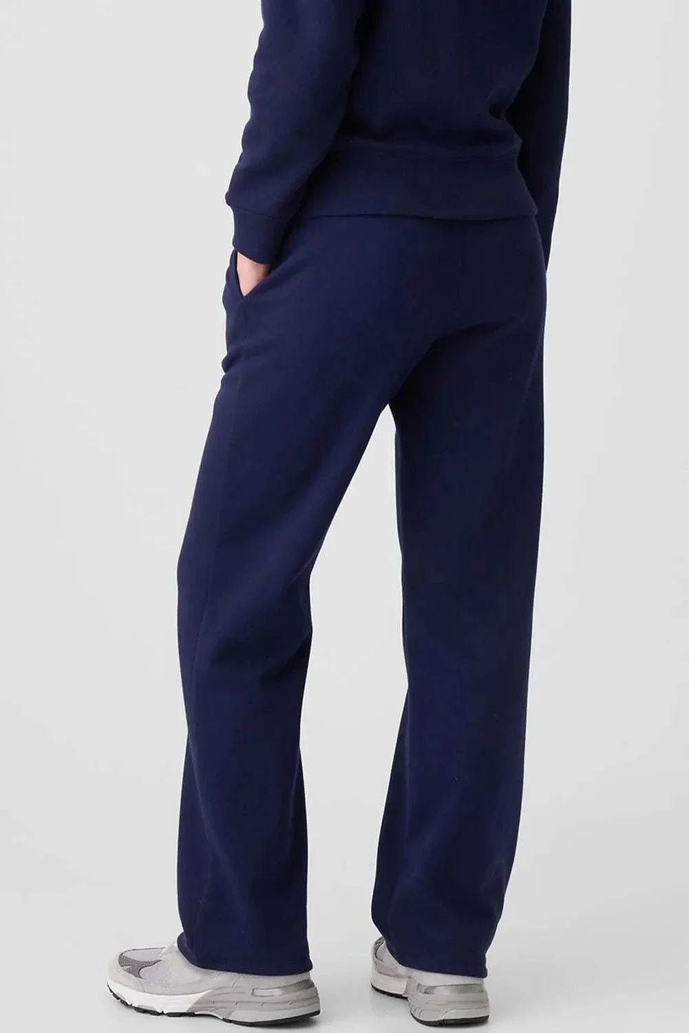 Drawstring pants with pockets in navy blue, featuring a comfortable fit.